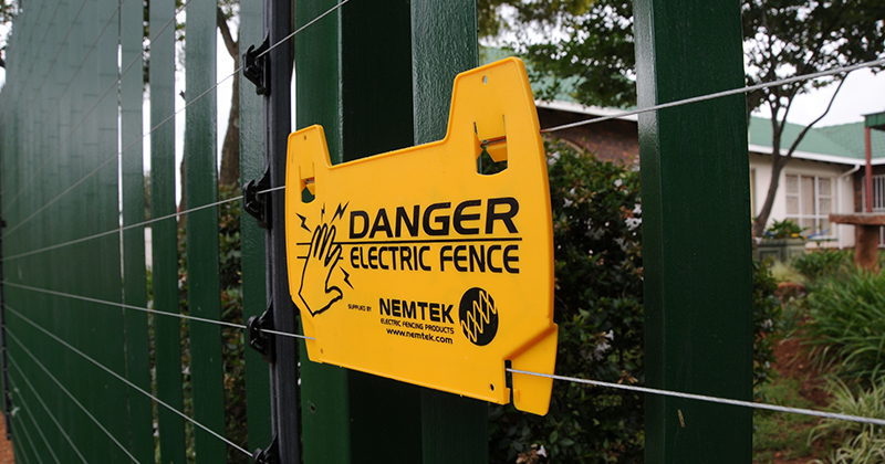 Monitored electric fence provides home security